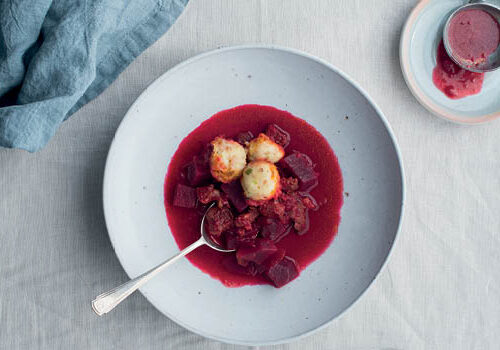 Beetroot, beef and bacon soup with cream cheese dumplings