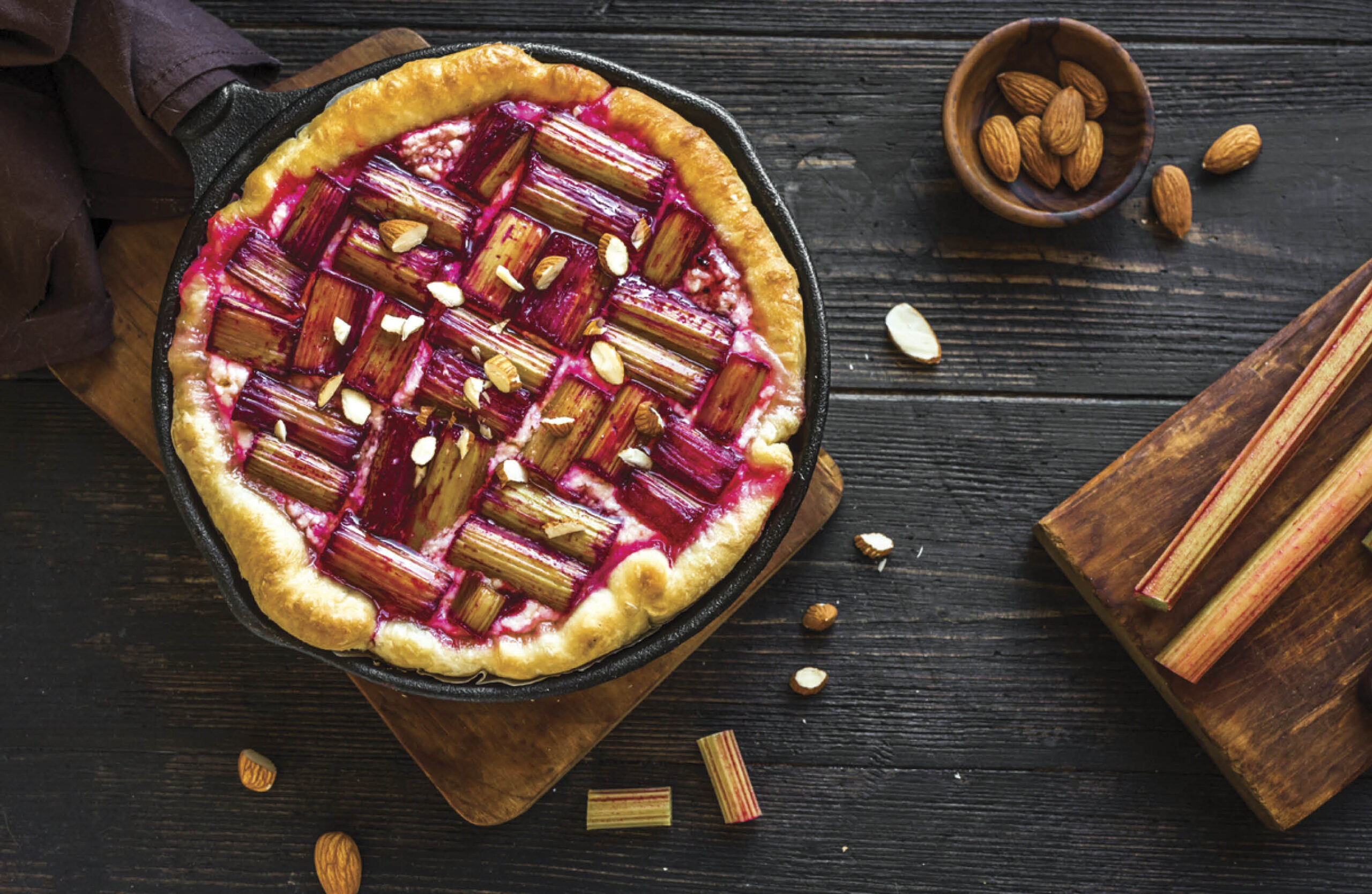 Homemade rhubarb dessert laid out next to ingredients.